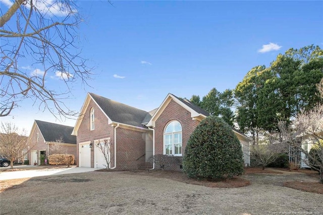 view of side of property with a garage