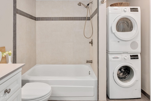 laundry room featuring stacked washing maching and dryer