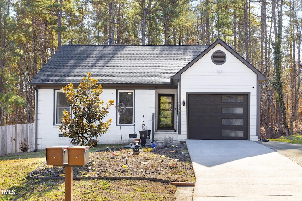 view of front of property featuring a garage