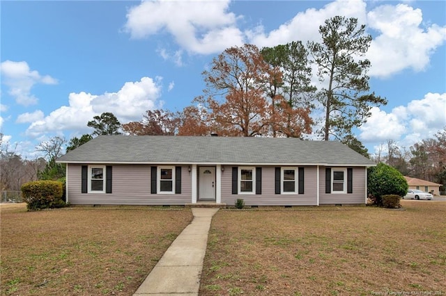 ranch-style house featuring a front lawn