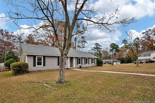 view of front of property with a front lawn