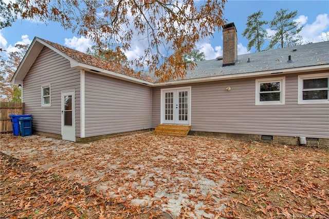 rear view of property with french doors