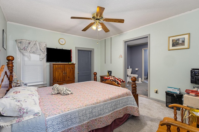 bedroom with ornamental molding, carpet flooring, ceiling fan, and a textured ceiling