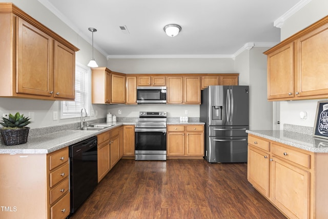 kitchen featuring appliances with stainless steel finishes, dark wood finished floors, light countertops, and a sink