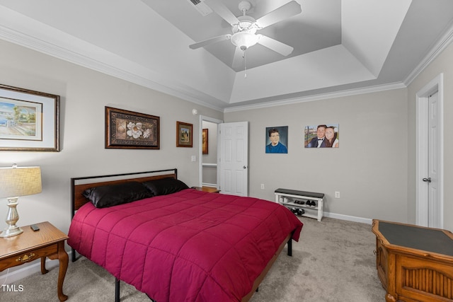 bedroom with ornamental molding, a raised ceiling, light colored carpet, and baseboards