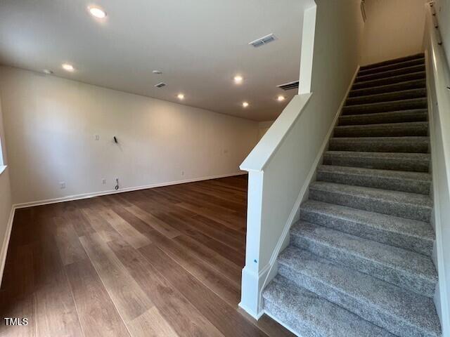 144 Parker Ln, Mebane, NC 27302 - stairs with recessed lighting, visible vents, baseboards, and wood finished floors