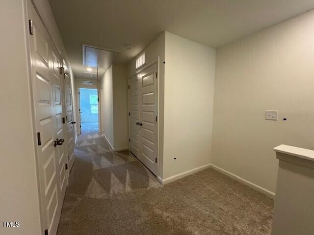 144 Parker Ln, Mebane, NC 27302 - hallway featuring attic access, baseboards, and carpet