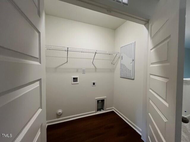 144 Parker Ln, Mebane, NC 27302 - laundry area featuring laundry area, wood finished floors, washer hookup, hookup for an electric dryer, and baseboards