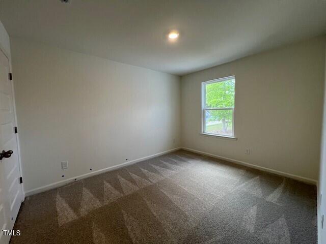 144 Parker Ln, Mebane, NC 27302 - empty room with baseboards, carpet, and recessed lighting