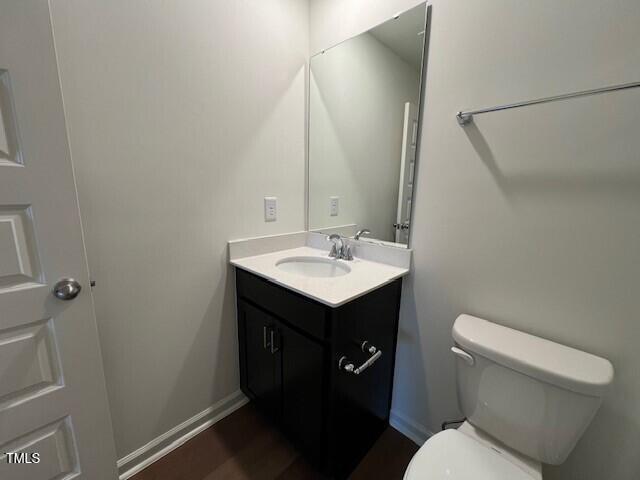 144 Parker Ln, Mebane, NC 27302 - bathroom with toilet and vanity