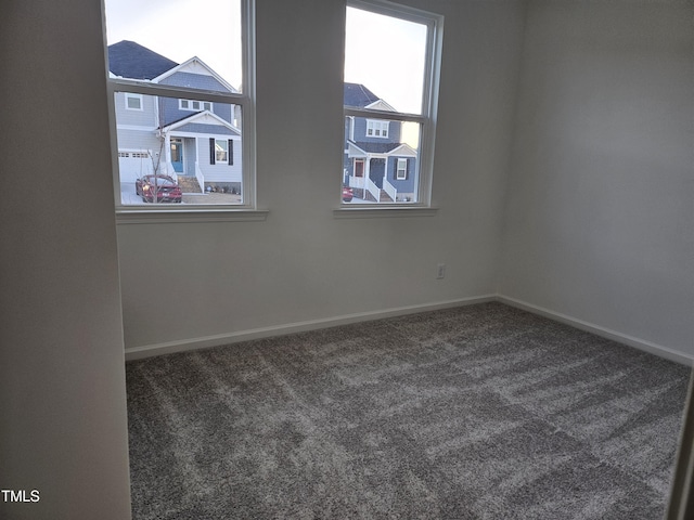 view of carpeted spare room