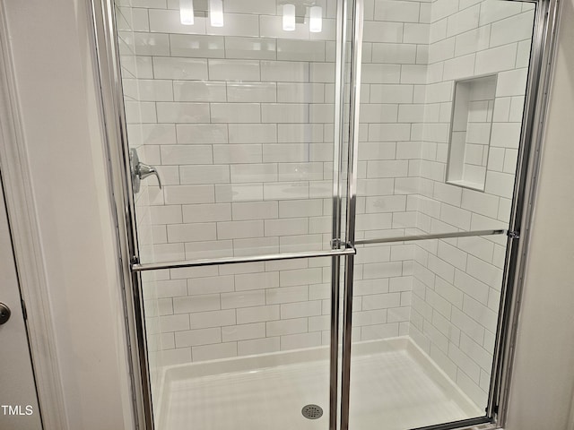 bathroom with walk in shower