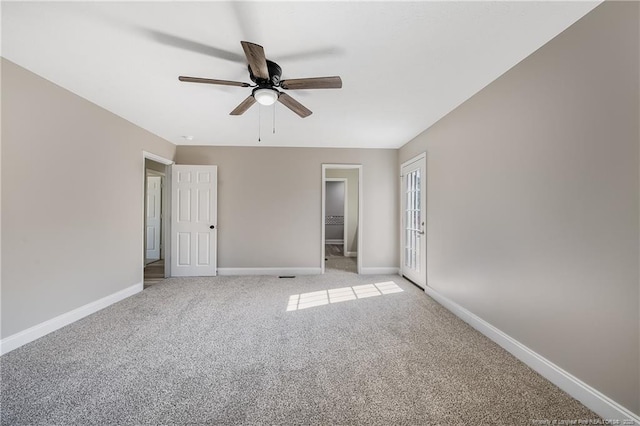 unfurnished bedroom featuring light colored carpet, a closet, and ceiling fan