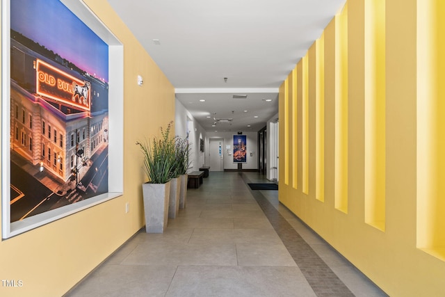 corridor with tile patterned flooring