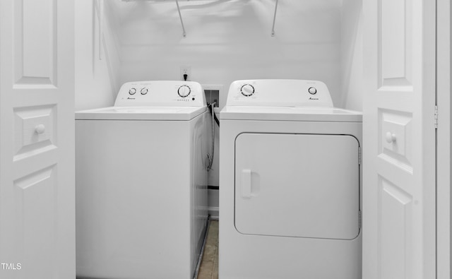 laundry room featuring independent washer and dryer