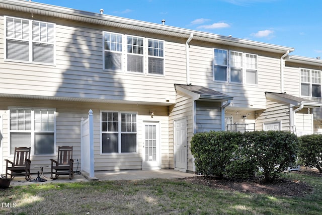 rear view of property with a patio