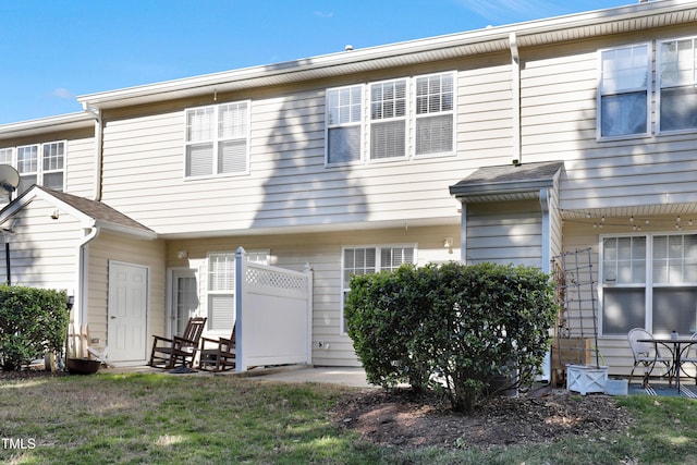 rear view of house featuring a patio