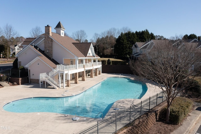 view of swimming pool featuring a patio