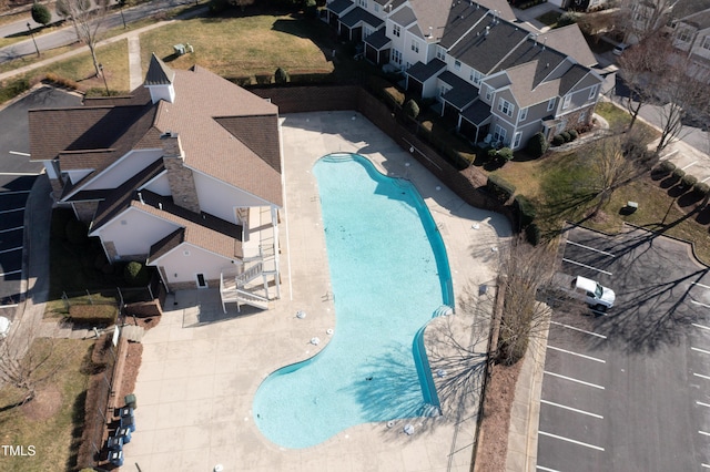 view of swimming pool with a patio