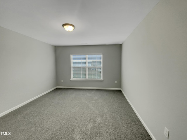 empty room with carpet flooring