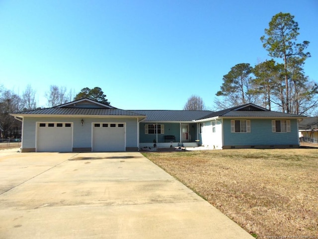 single story home featuring a garage and a front lawn