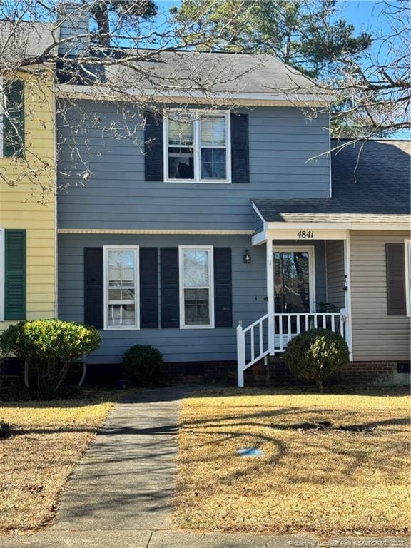 view of front of home with a front yard