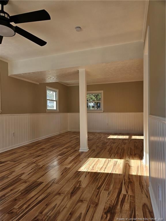 interior space featuring hardwood / wood-style floors and ceiling fan