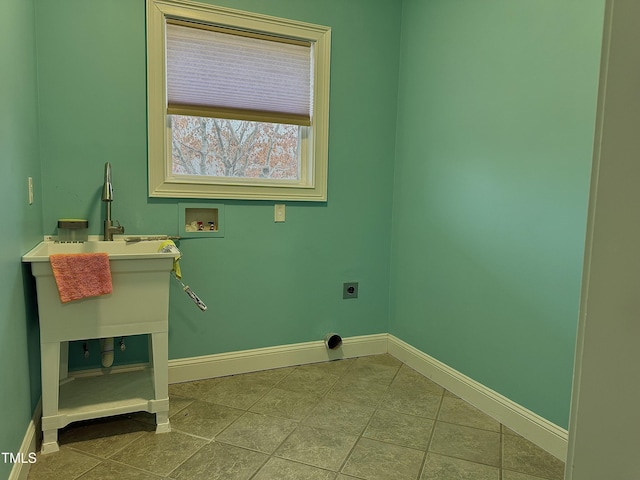 laundry room featuring washer hookup, hookup for an electric dryer, and tile patterned floors