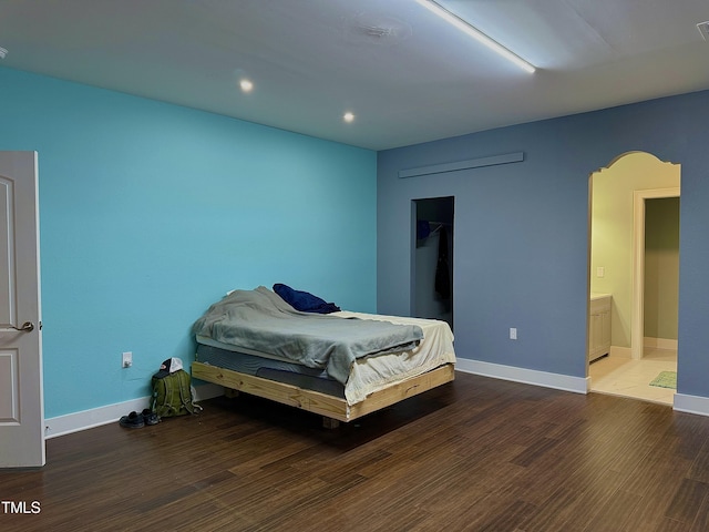 bedroom featuring hardwood / wood-style flooring