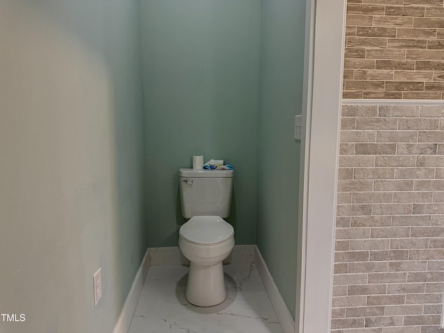 bathroom featuring toilet