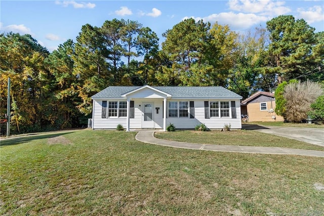 ranch-style house with a front lawn