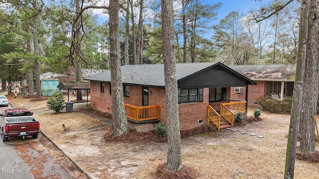 view of front of home featuring a carport