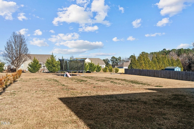 view of yard with a trampoline