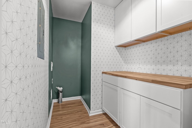 laundry area featuring light hardwood / wood-style flooring