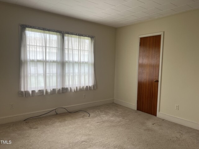 405 N Wilson Ave, Dunn, NC 28334 - empty room featuring carpet and baseboards