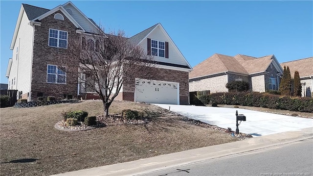 3922 Tasha Dr, Hope Mills, NC 28348 - front facade featuring a garage