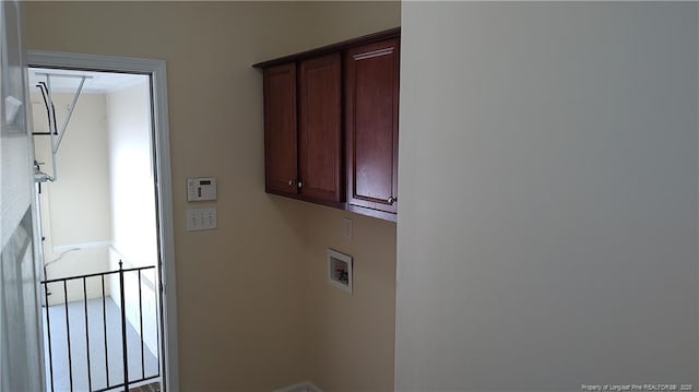 3922 Tasha Dr, Hope Mills, NC 28348 - clothes washing area featuring cabinets and washer hookup