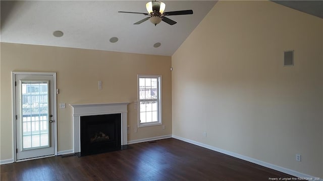 3922 Tasha Dr, Hope Mills, NC 28348 - unfurnished living room featuring lofted ceiling, dark wood-type flooring, and ceiling fan