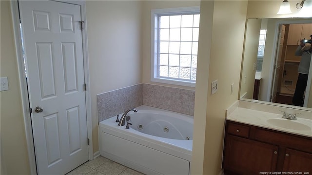 3922 Tasha Dr, Hope Mills, NC 28348 - bathroom with tile patterned flooring, vanity, and a bath