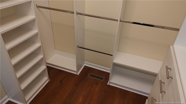 3922 Tasha Dr, Hope Mills, NC 28348 - walk in closet featuring dark hardwood / wood-style flooring