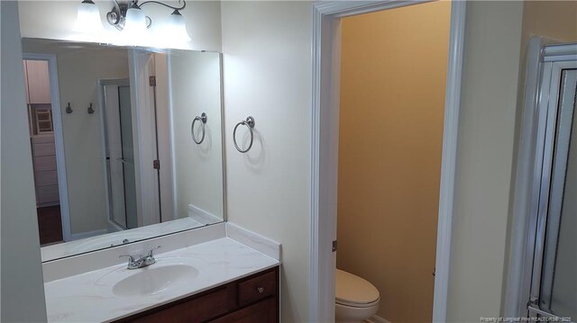 3922 Tasha Dr, Hope Mills, NC 28348 - bathroom featuring vanity and toilet