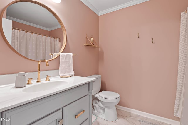 bathroom featuring vanity, ornamental molding, and toilet