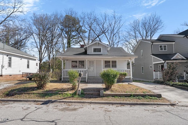 bungalow-style home featuring covered porch