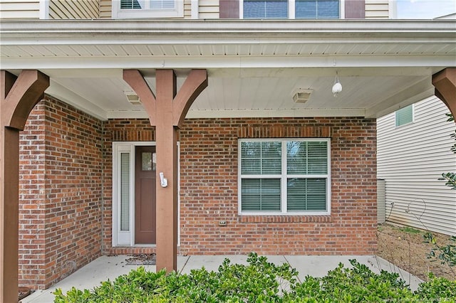 323 River Oak St, Spring Lake, NC 28390 - doorway to property featuring brick siding
