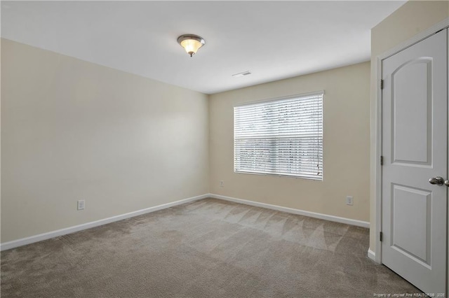 323 River Oak St, Spring Lake, NC 28390 - unfurnished room featuring light carpet, baseboards, and visible vents