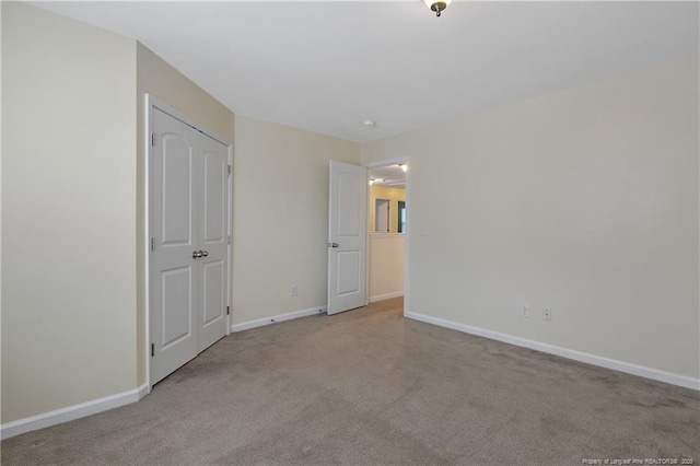 323 River Oak St, Spring Lake, NC 28390 - unfurnished bedroom with baseboards and carpet floors