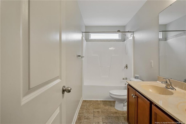323 River Oak St, Spring Lake, NC 28390 - full bathroom with a sink, toilet,  shower combination, double vanity, and baseboards