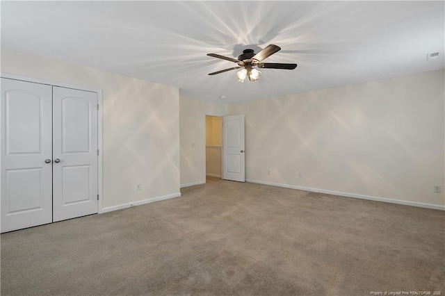 323 River Oak St, Spring Lake, NC 28390 - empty room featuring baseboards, a ceiling fan, and carpet floors