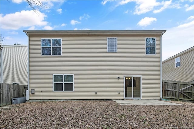 323 River Oak St, Spring Lake, NC 28390 - back of property featuring a fenced backyard and a patio