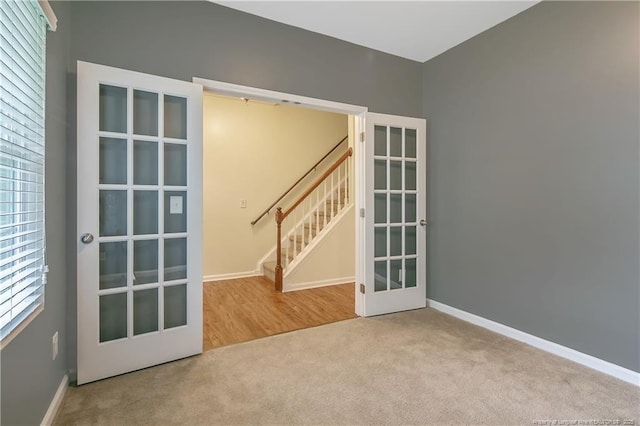 323 River Oak St, Spring Lake, NC 28390 - doorway featuring carpet flooring, french doors, baseboards, and stairs